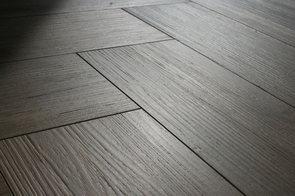 Фаска каменного SPC ламината Steinholz Herringbone