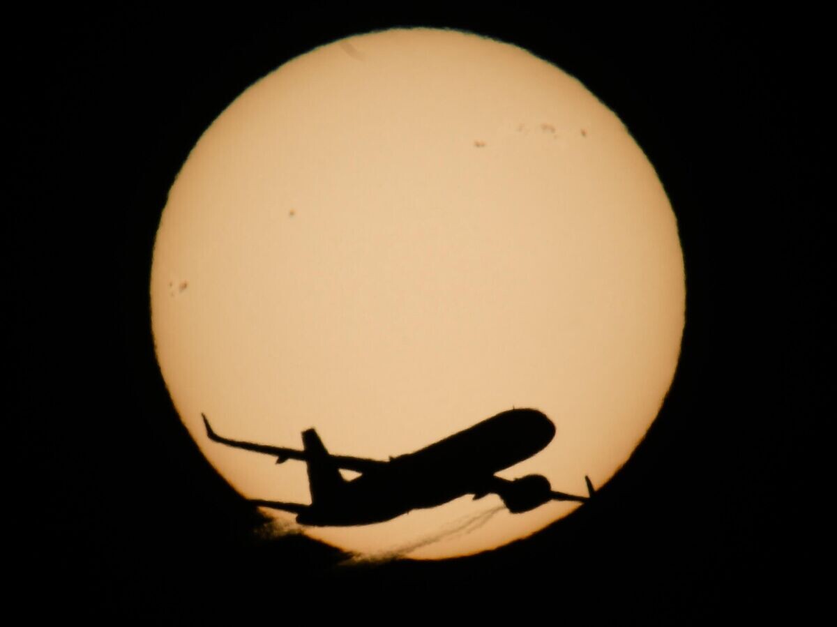    Самолет в небе | © РИА Новости / Александр Кряжев