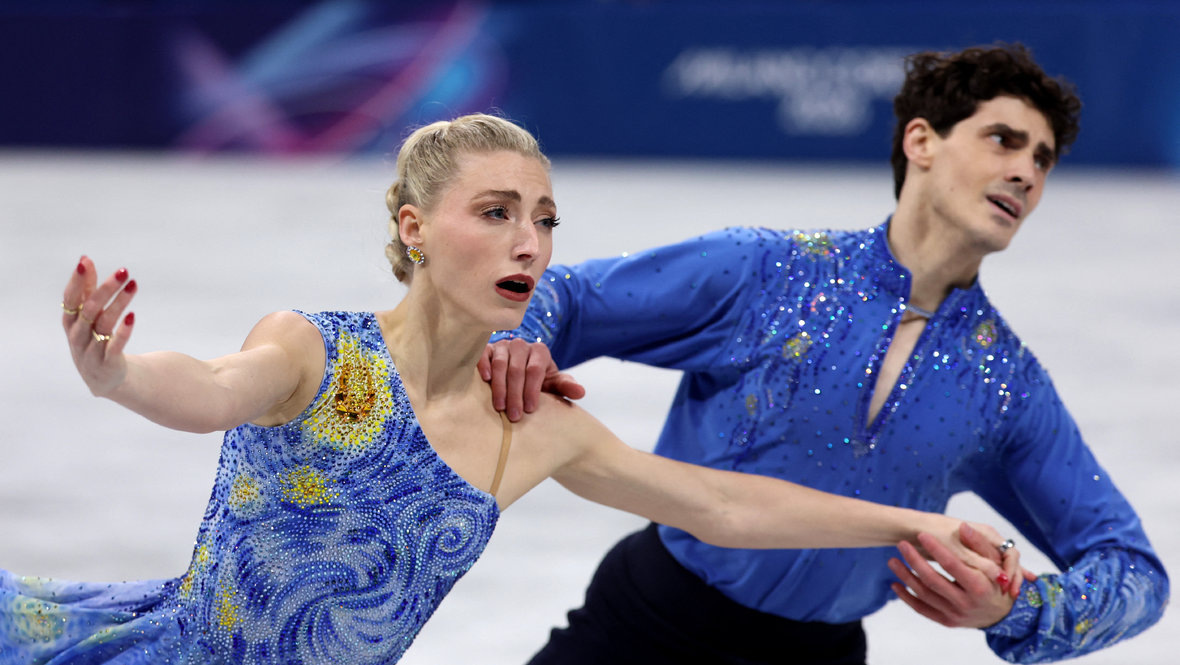    Пайпер Гиллес и Поль Пуарье. Reuters