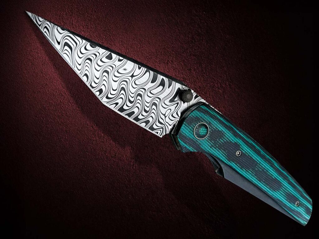 Джейк Маккой создал клинок для своего складного ножа из дамасской стали Zeus от Baker.