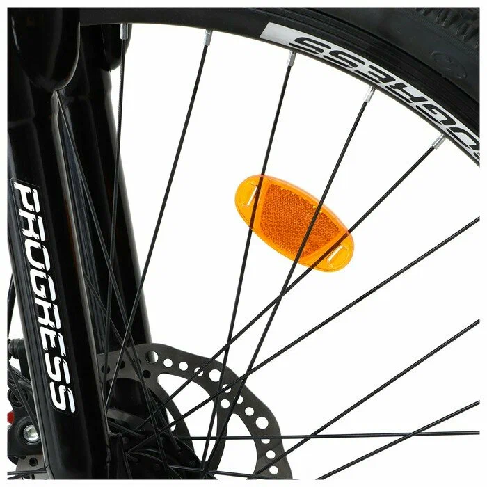 Катафот (световозвращатель) на колесе велосипеда