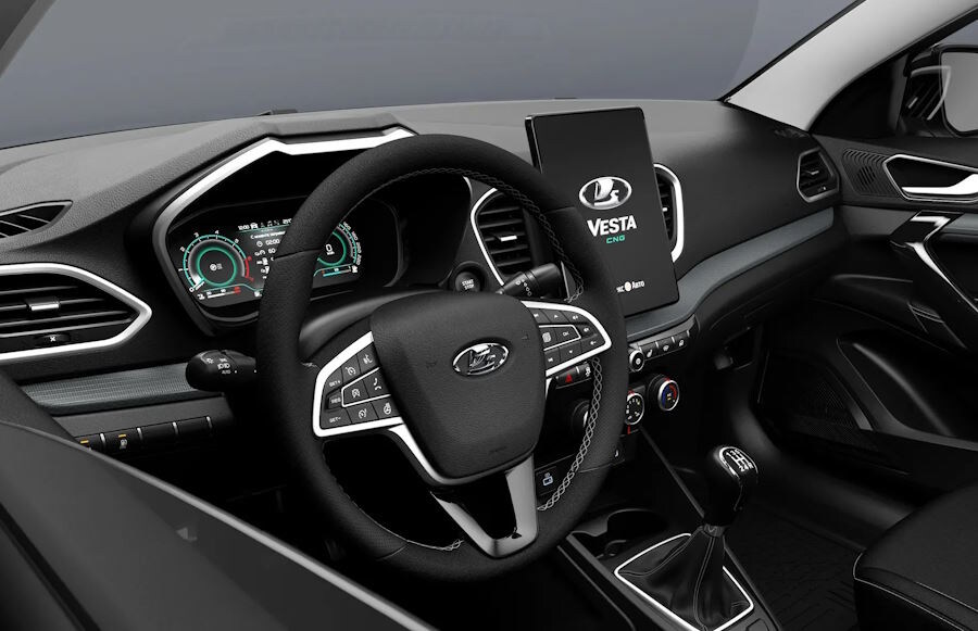 Двухтопливная версия получила другое оформление панели приборов — с шкалами бирюзового цвета