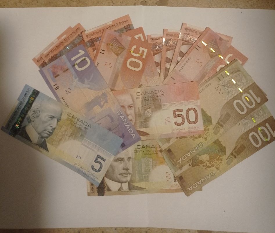 Старые канадские доллары
