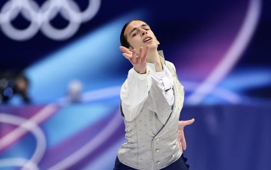 Петр Гуменник во время исполнения произвольной программы на ОИ в Милане