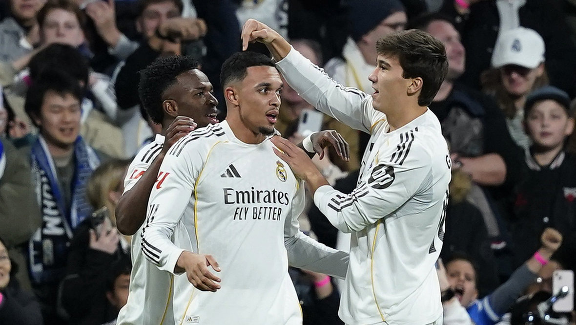    Винисиус Жуниор, Трент Александр-Арнолд и Гонсало Гарсия. Reuters