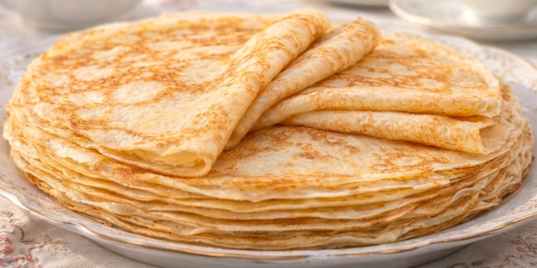 Тонкие блины на молоке и воде, которые не рвутся и легко переворачиваются