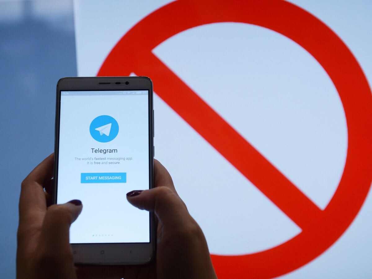    Мессенджер Telegram на экране телефона | © РИА Новости / Кирилл Каллиников