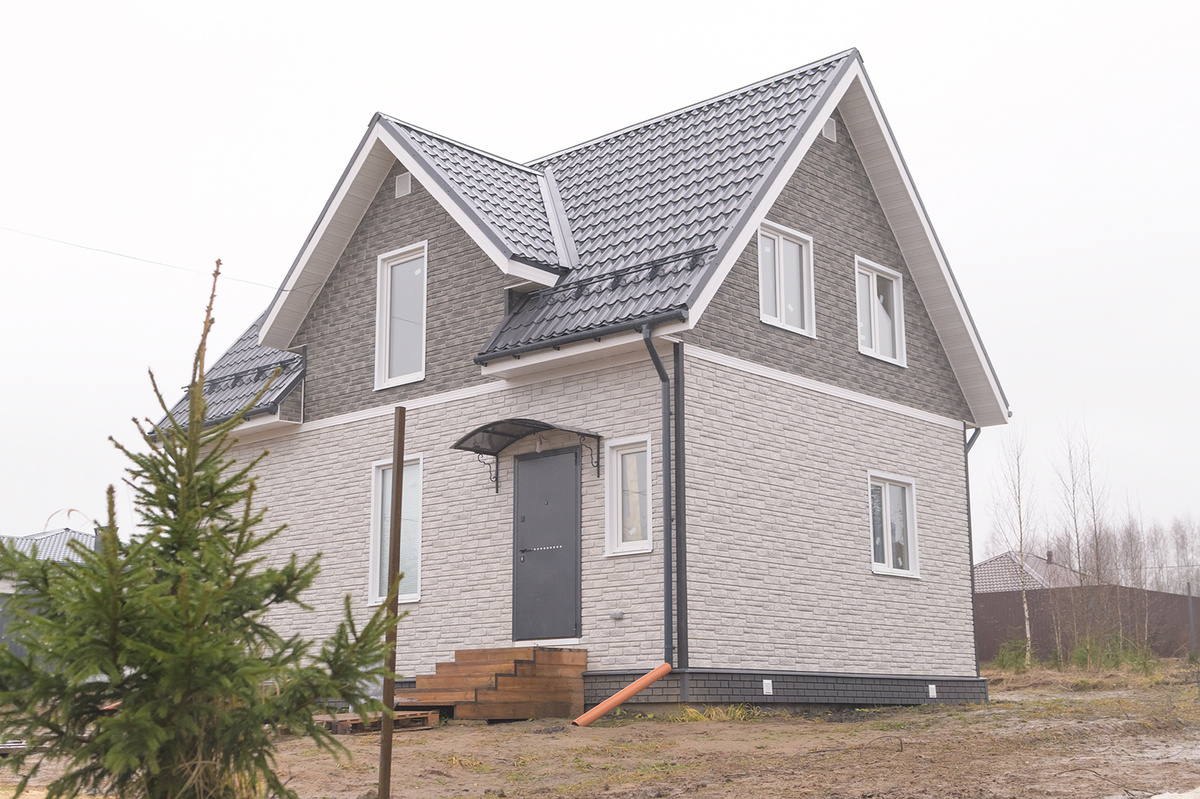 Виниловые фасадные панели под камень