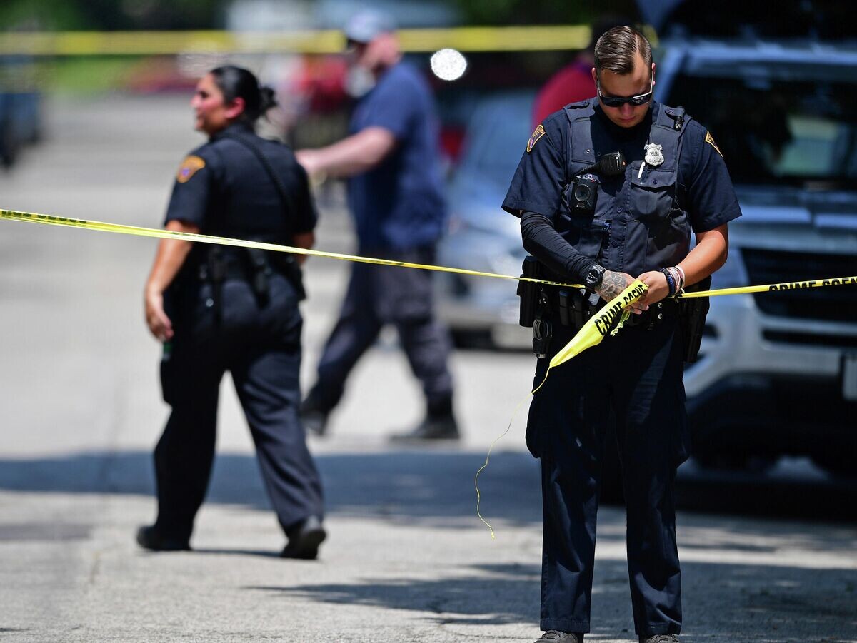    Американская полиция на месте преступления | © AP Photo / David Dermer