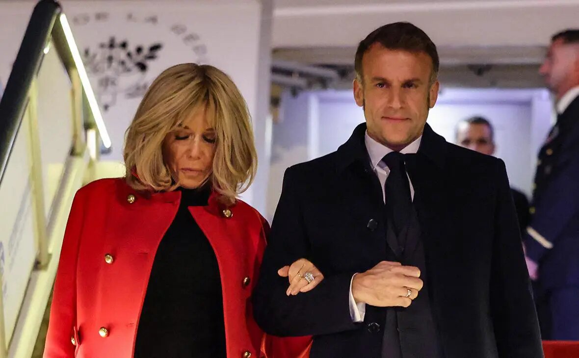    Эмманюэль Макрон с супругой Брижит Фото: Ludovic Marin / Getty Images Оксана