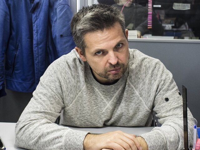    Фото: AP Photo/Evgeny Feldman (Роман Баданин признан иноагентом в РФ)