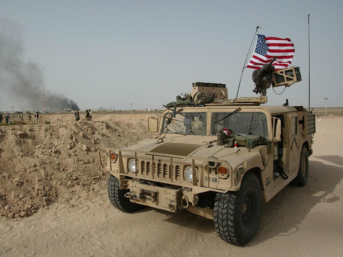    Американские военные в Умм-Каср, Ирак. 22 марта 2003 год | © AP Photo / Simon Walker/The Times/Pool