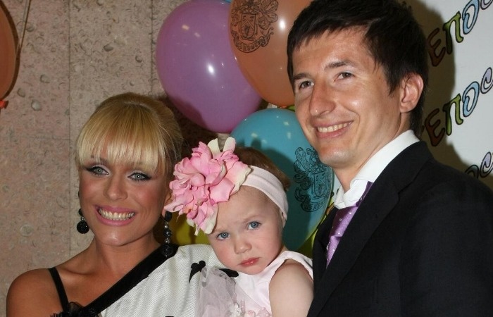 Юлия Началова и Евгений Алдонин с дочерью.
