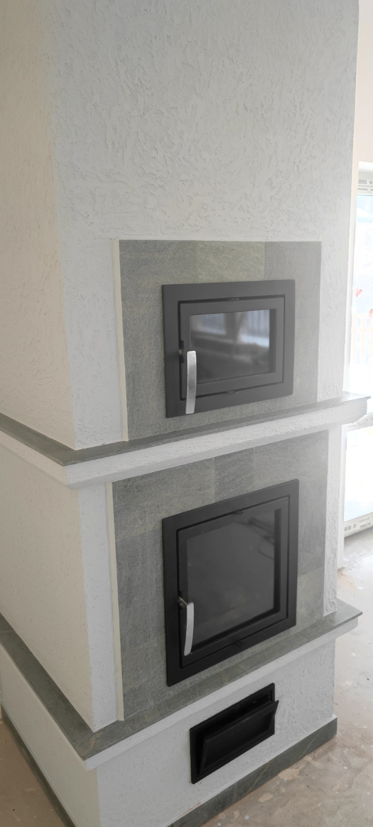 Печь после штукатурки.