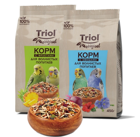 На фото — полнорационные корма для волнистых попугаев с фруктами и овощами Triol Original. В состав входят злаковая смесь из проса и овса, семена подсолнечника, суданской травы, конопли и льна, канареечное семя, а также фрукты и овощи. Сбалансированная рецептура способствует поддержанию здоровья и активности пернатого питомца.