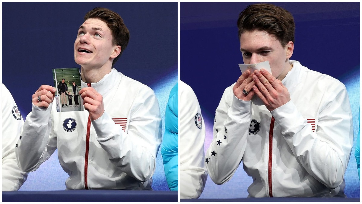    Максим Наумов с фотографией родителей после своего проката на ОИ.