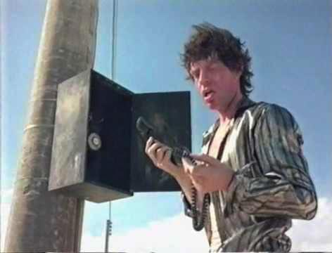 Мик Джаггер в фильме «Running Out of Luck», 1985 г.