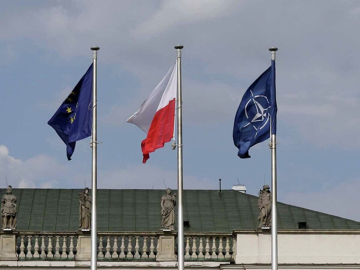    Флаги: Польши, ЕС и НАТО | © Flickr / Lukas Plewnia
