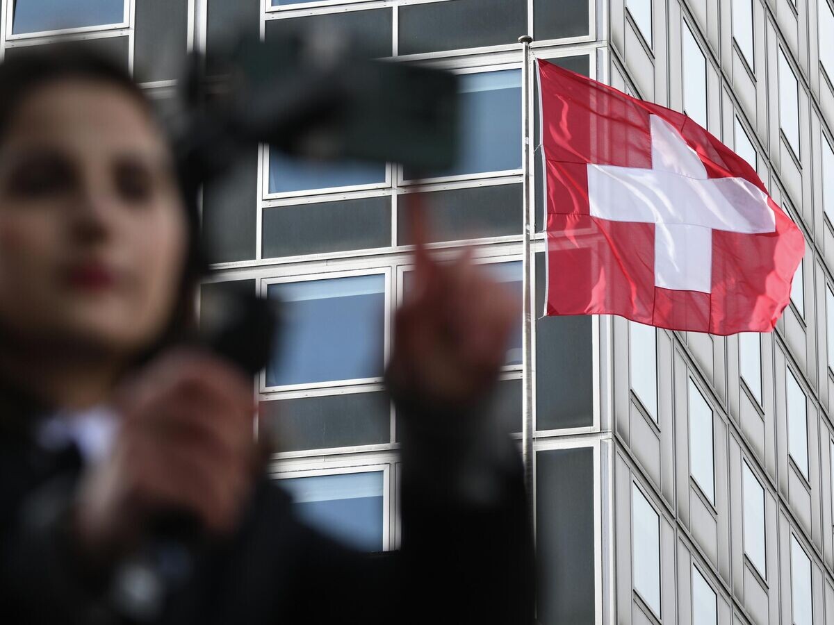    Государственный флаг Швейцарии в Женеве | © РИА Новости / Кирилл Зыков
