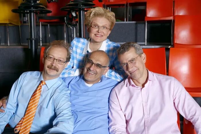 Юрий и Василий Малышевы с родителями.