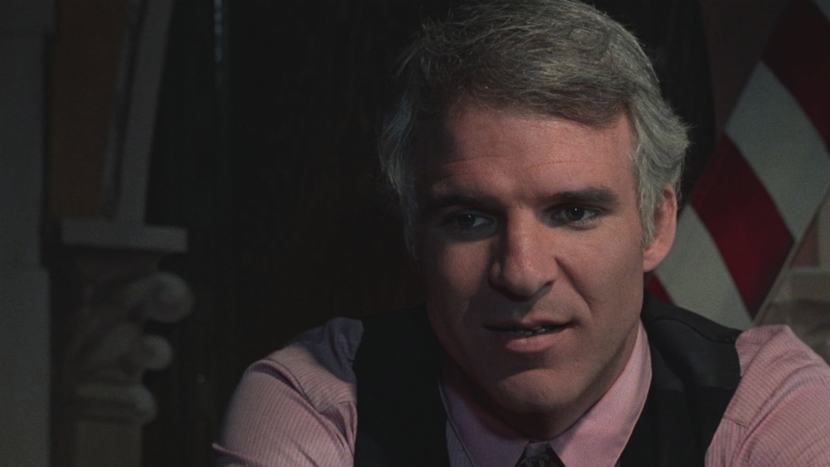 Кадр из фильма "Придурок" (Крис Мартин)