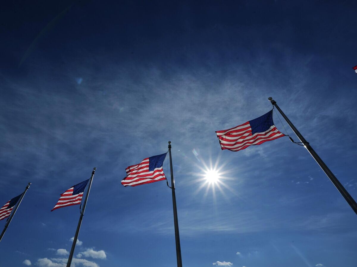    Флаги США в Вашингтоне | © AP Photo / Julio Cortez