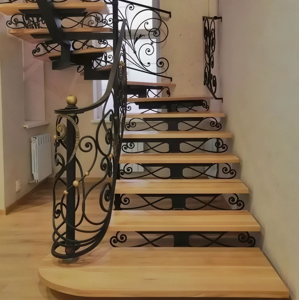 Кованые лестницы на монокосоуре с перилами от ХК "Наковали"