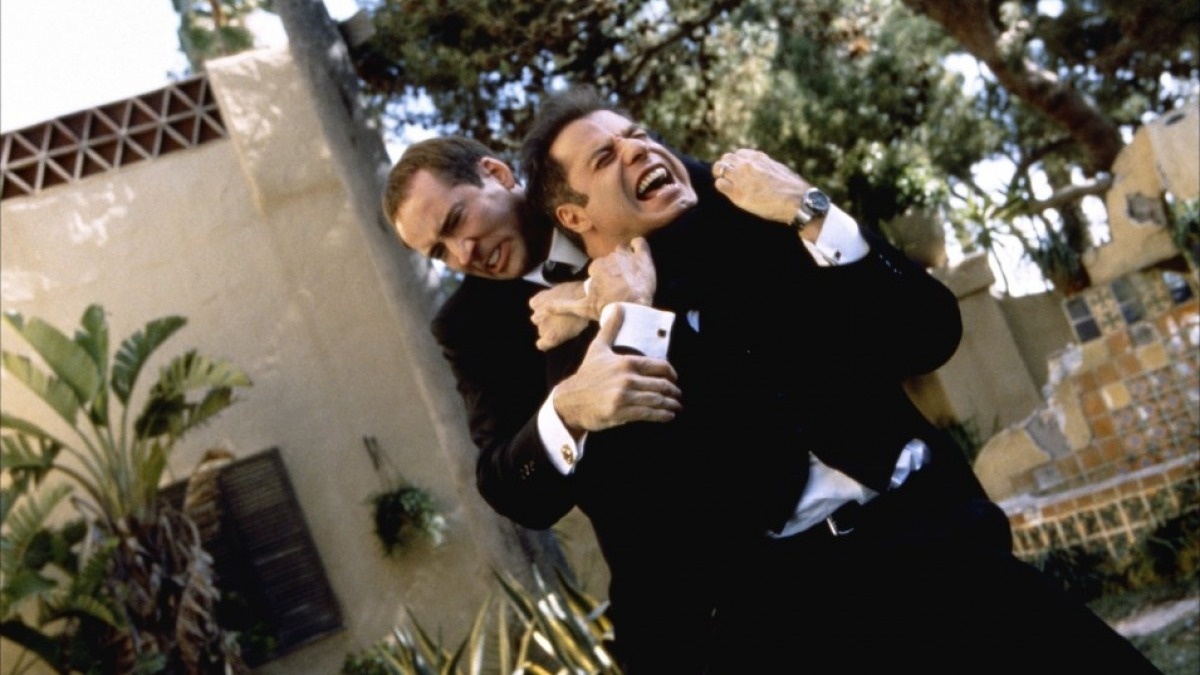 Николас Кейдж и Джон Траволта в фильме «Без лица» / Источник: Paramount Pictures