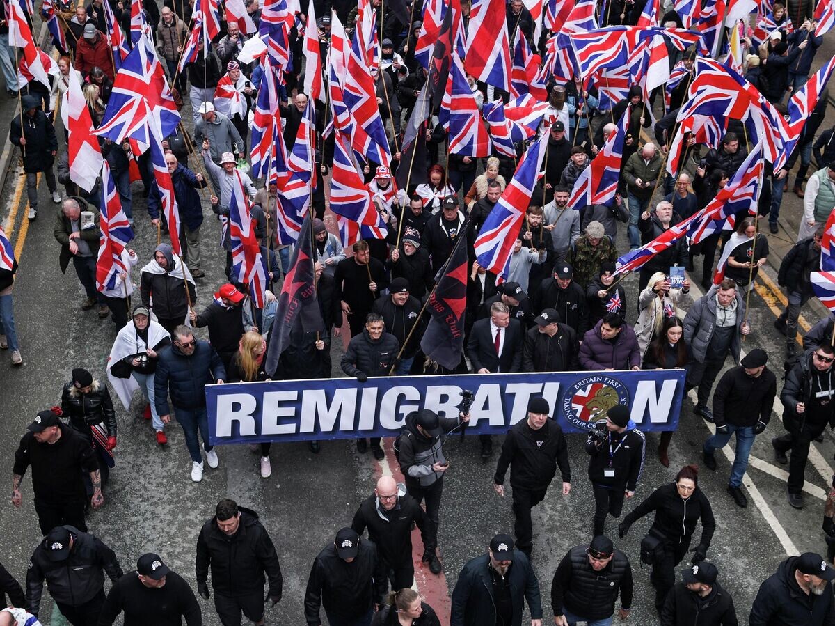    Участники марша против миграции в Манчестере, Великобритания | © REUTERS / Temilade Adelaja
