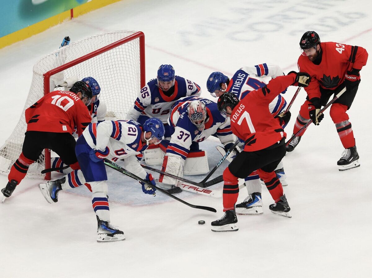    Эпизод хоккейного финала Олимпиады-2026 | © Getty Images / Jamie Squire
