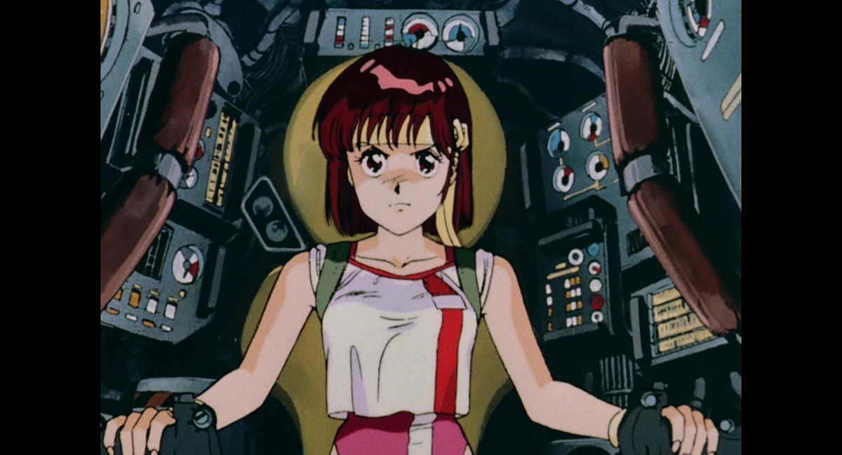 Главная героиня внутри гигантского робота. Кадр из аниме «Дотянись до неба» / Gunbuster (1988). © Gainax / Bandai Visual