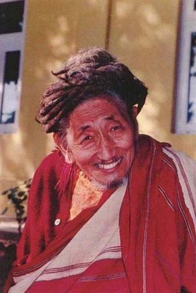 Тогден Аджам