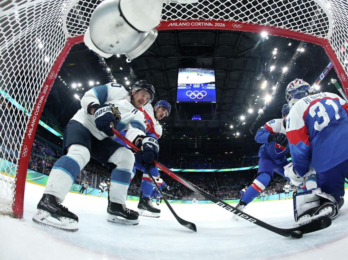    Эпизод матча Словакия - Финляндия на Олимпиаде-2026 | © REUTERS / BRUCE BENNETT