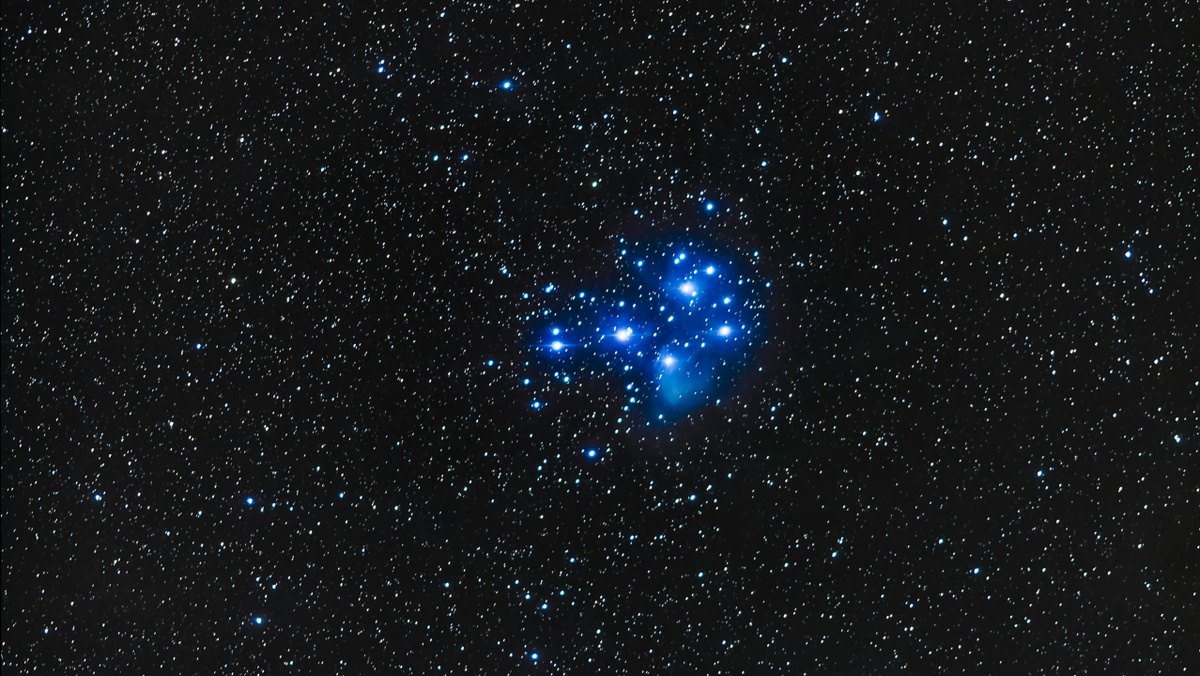 Рассеянное звездное скопление Плеяды.