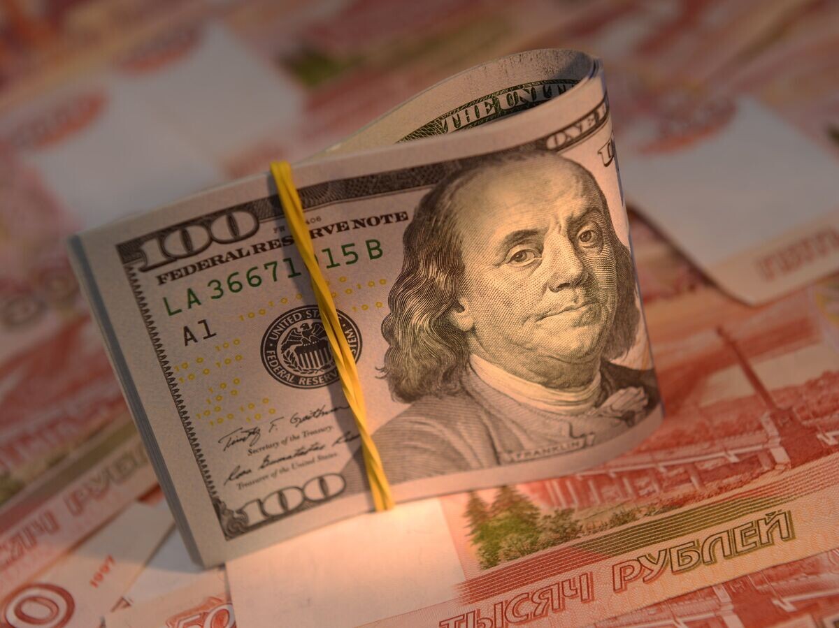    Денежные купюры России и США© РИА Новости . Владимир Трефилов