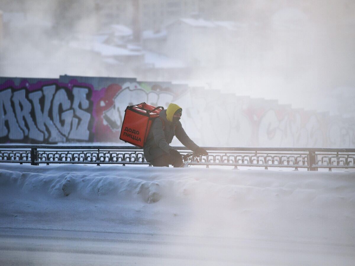    Курьер пиццерии "Додо Пицца" | © РИА Новости / Павел Лисицын