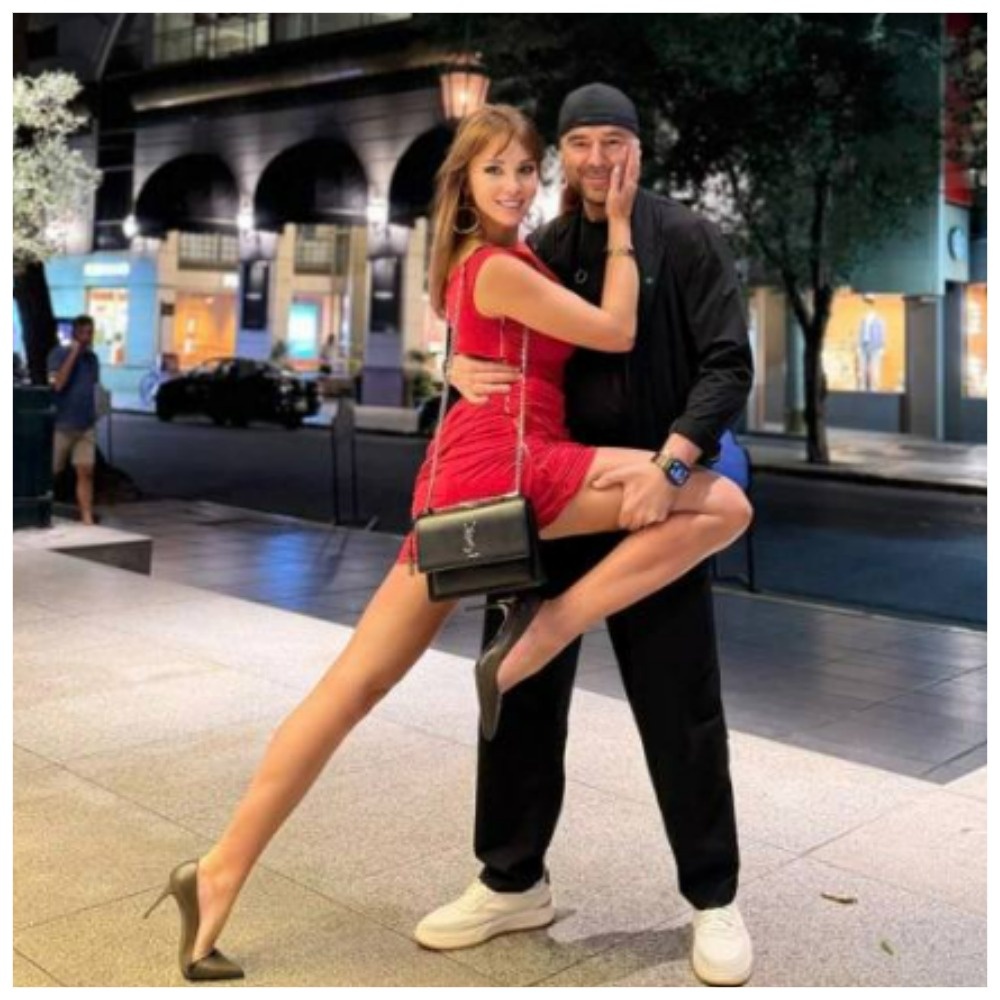 Полина Диброва  в страстном па закидывает ногу на возлюбленного