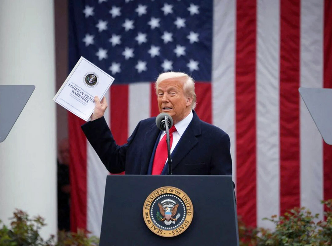 used image: Donald Trump with Report on Foreign Trade Barriers // Internet