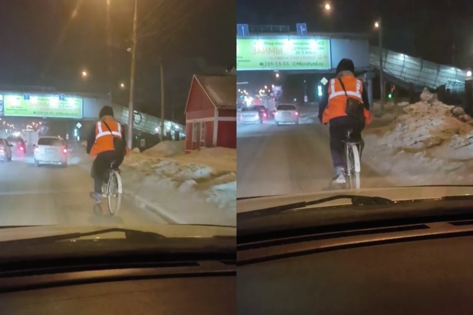    Утром 26 февраля горожане с удивлением наблюдали за человеком на двух колесах. Фото: стоп-кадр из видео очевидца.