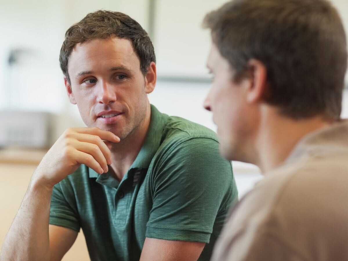    Мужчины беседуют | © Depositphotos.com / Wavebreak Media LTD