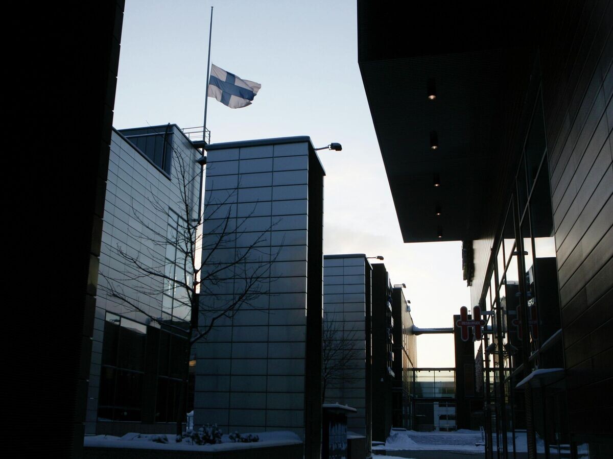    Флаг Финляндии на здании в Хельсинки | © AP Photo / Markus Schreiber