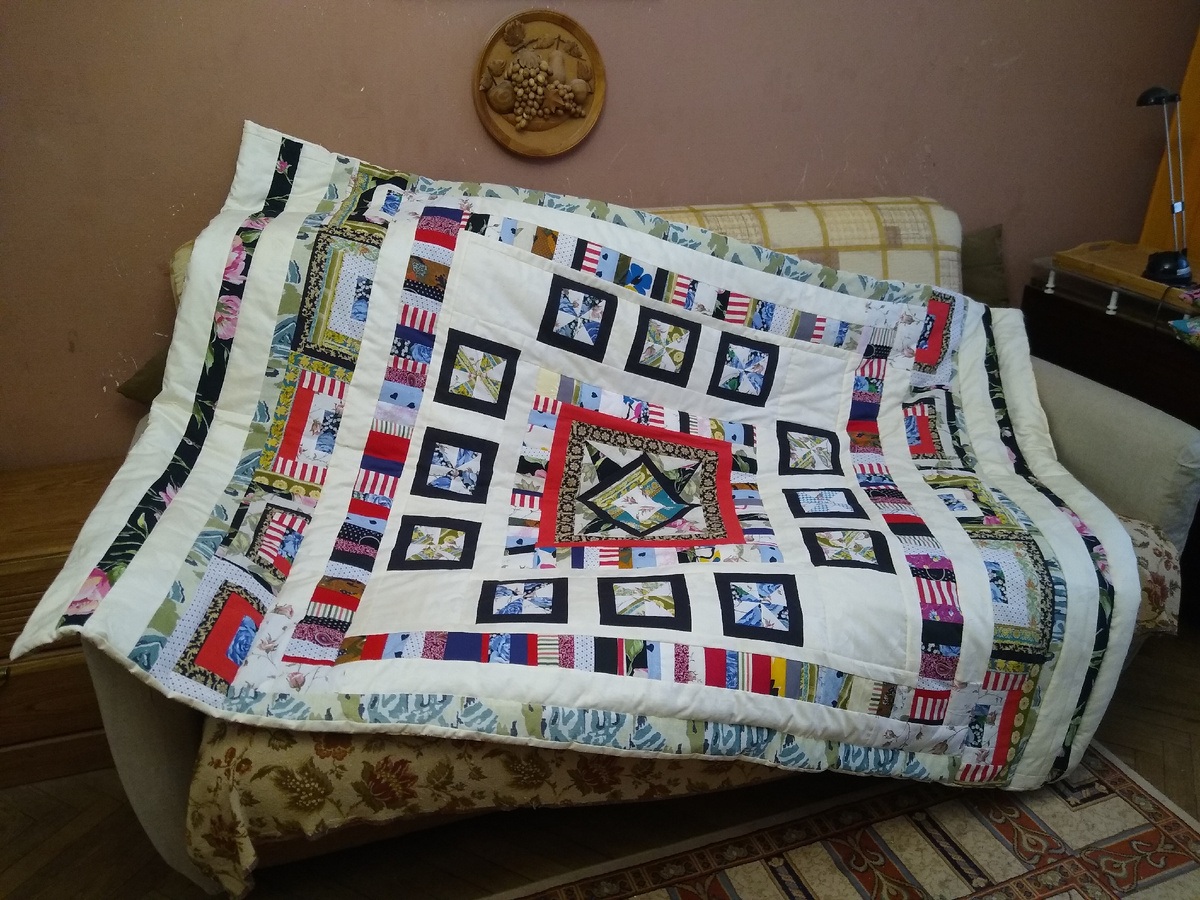 Размер одеяла 140х205.