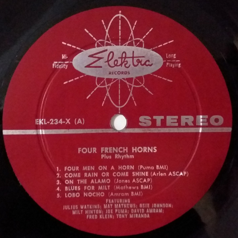 Префикс EKL-***-X и надпись Stereo, а также красный цвет этикетки отличает это стерео издание от моно