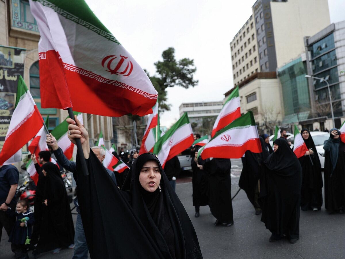    Акция под лозунгом "Никаких компромиссов и капитуляции - борьба против США" в связи с атакой США и Израиля в Тегеране | © REUTERS / Majid Asgaripour