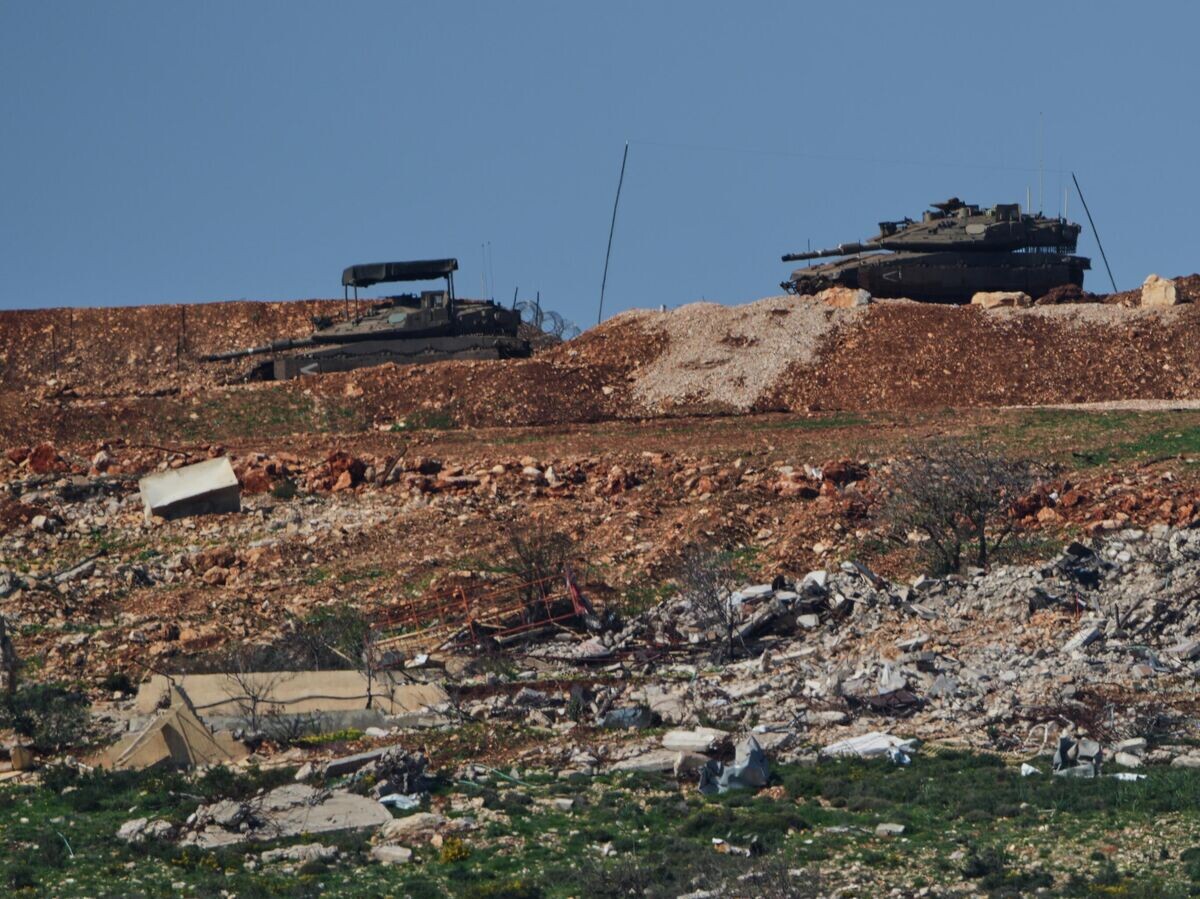    Израильские танки вблизи границы с Ливаном | © AP Photo / Ariel Schalit