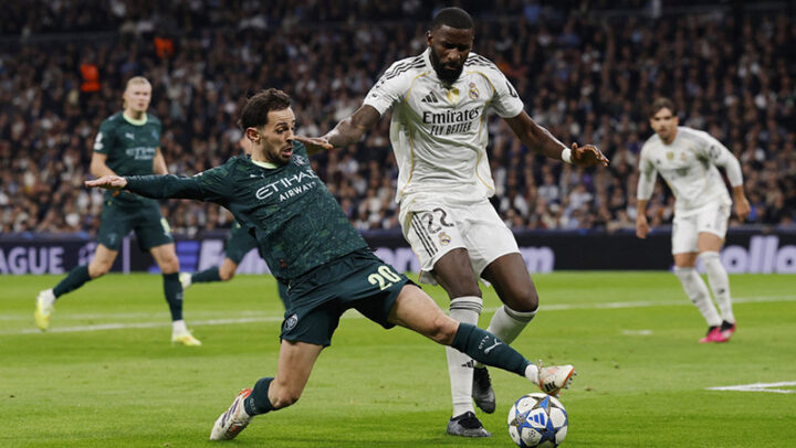 10 декабря 2025 года, Мадрид. «Реал» — «Манчестер Сити» — 1:2. Это был матч общего этапа Лиги чемпионов, а 11 и 17 марта команды Антонио Рюдигера (справа) и Бернарду Силвы встретятся вновь, но уже в 1/8 финала.