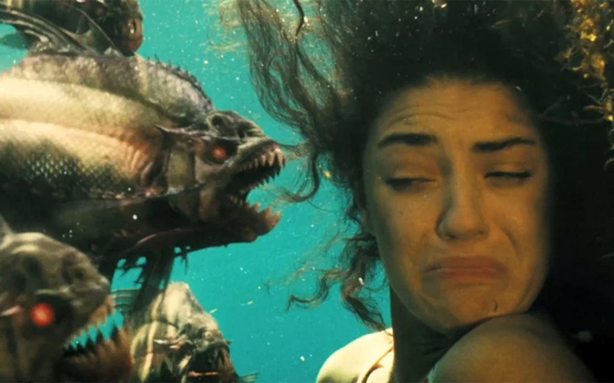 Кадр из фильма "Пираньи 3D"