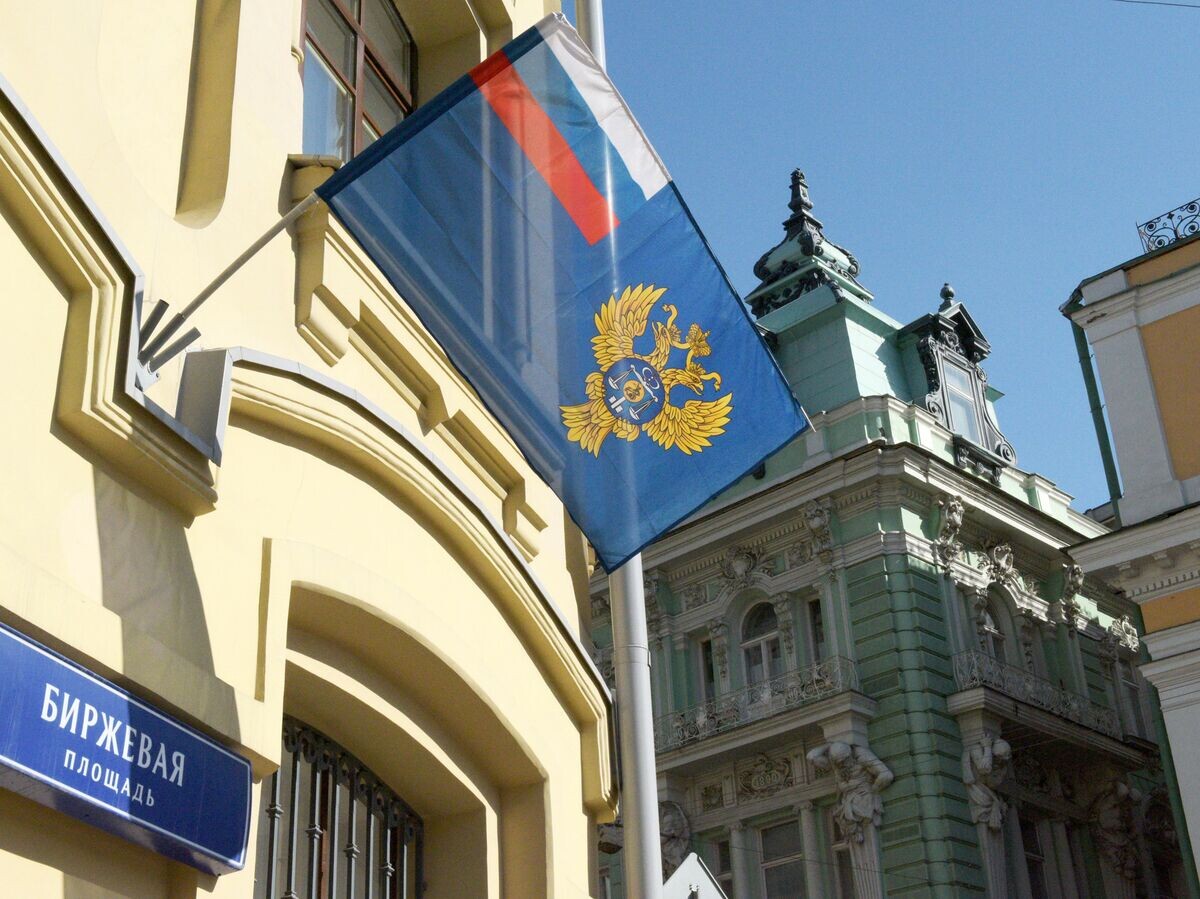    Флаг на здании Федерального казначейства на Биржевой площади в Москве | © РИА Новости / Наталья Селиверстова