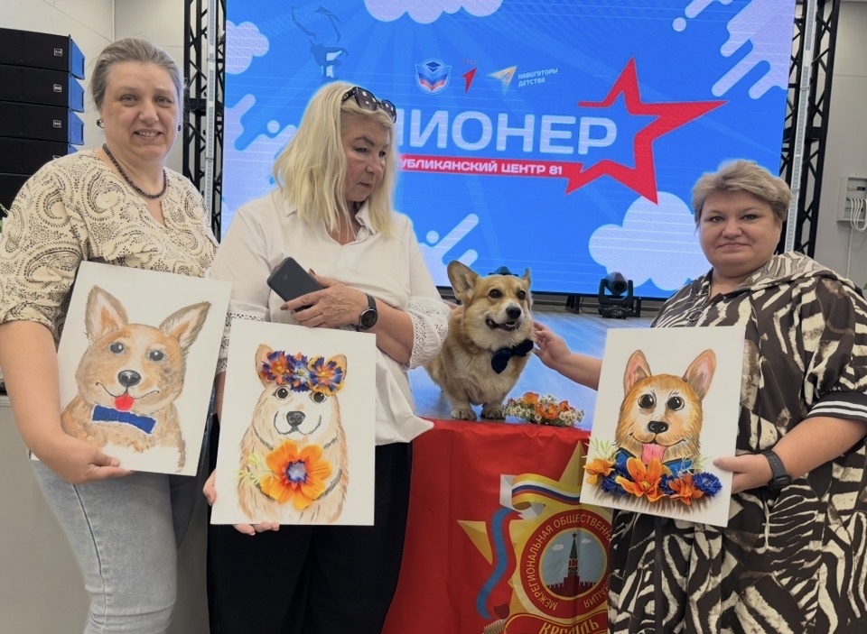 Корги-модель и юные художники недетского возраста