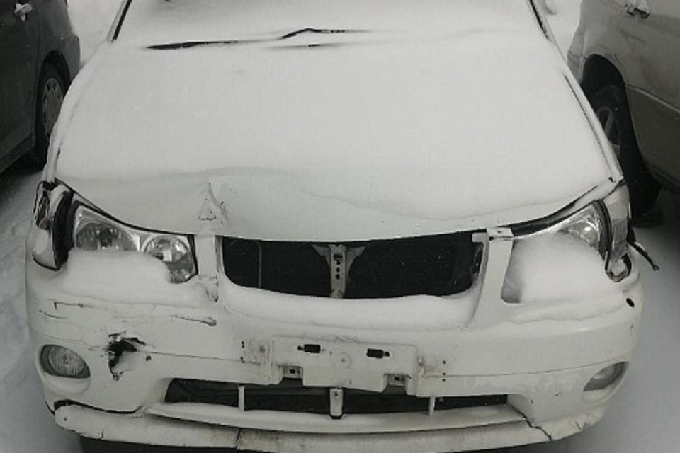    Машина стоит во дворе на улице Герцена. Фото: мэрия Новосибирска